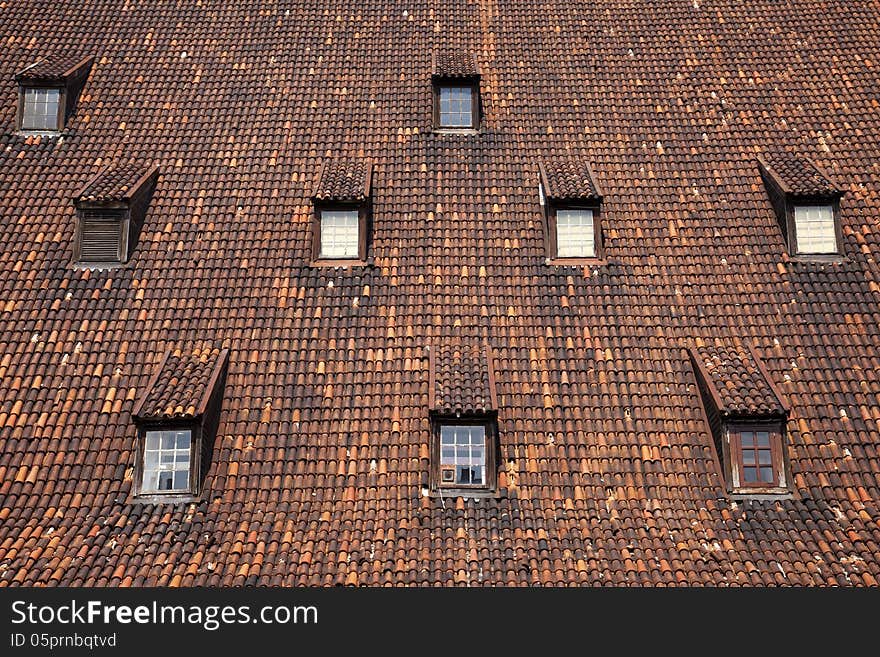 This is a detail of the interesting roof of an old mill in the Old Town (stare miasto) of Gdansk. This is a detail of the interesting roof of an old mill in the Old Town (stare miasto) of Gdansk.