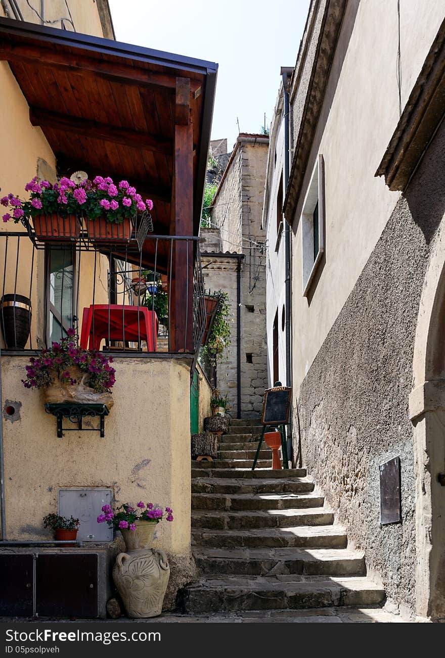 A quiet street in the mountain town of Castelmezzano located near Potenza Italy. A quiet street in the mountain town of Castelmezzano located near Potenza Italy