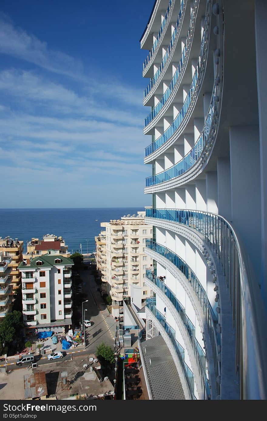 The view from the balcony of the city and the sea