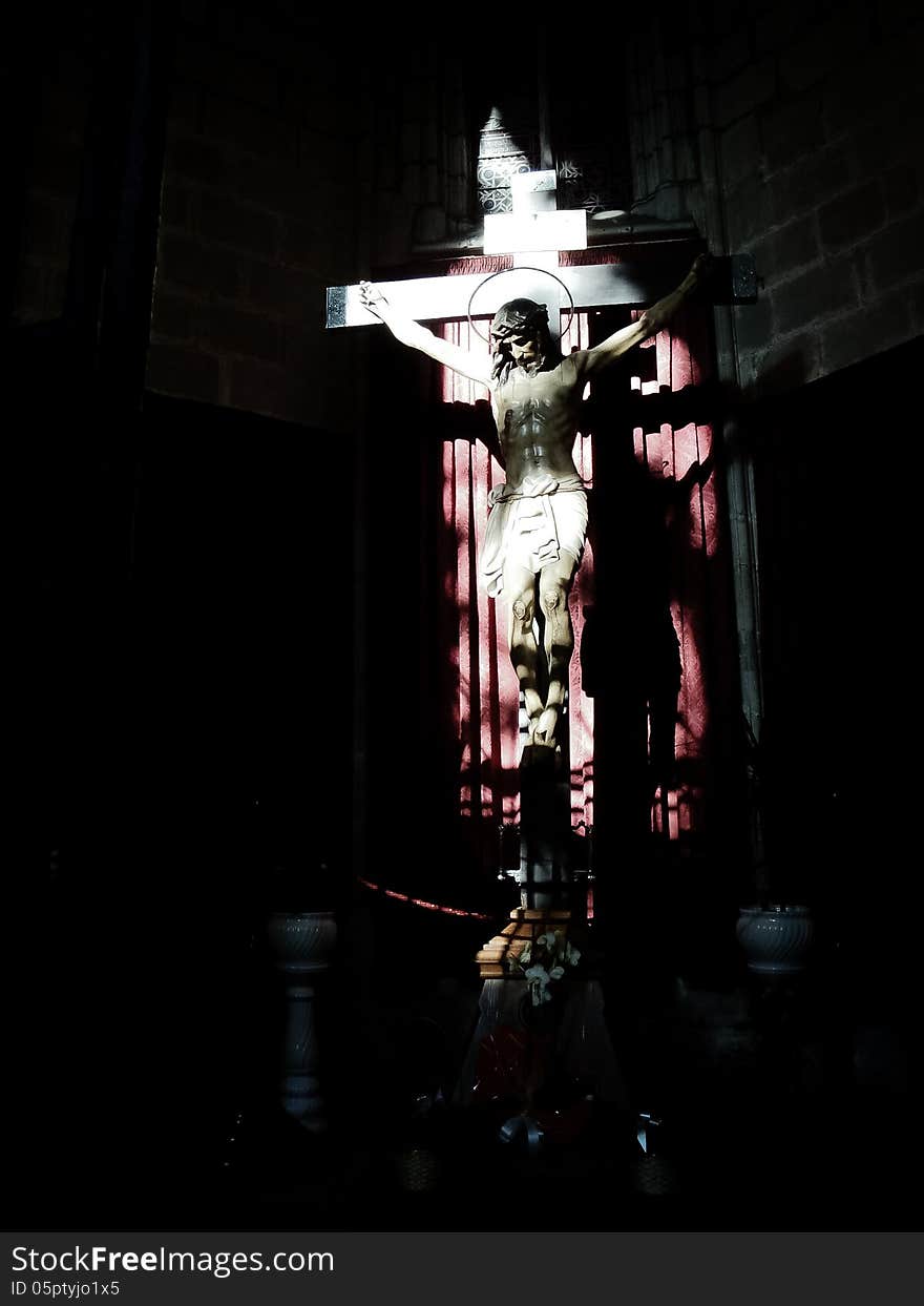 High contrast image of the crucifixion of Jesus at a church.