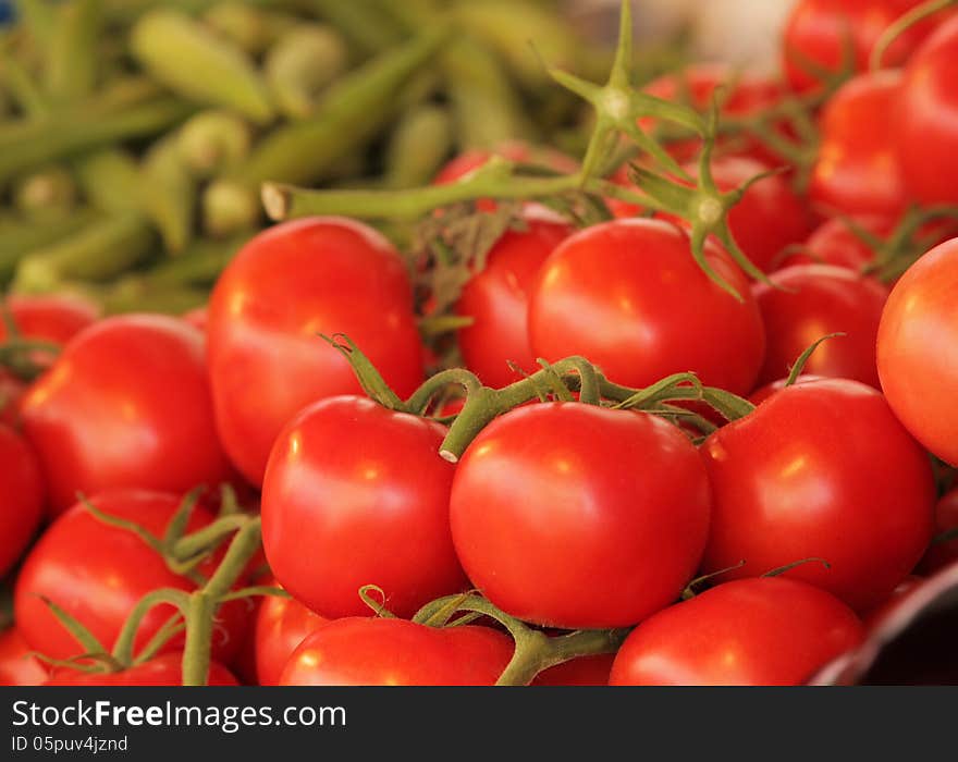 Fresh tomatoes on sale on a farmers market. Fresh tomatoes on sale on a farmers market