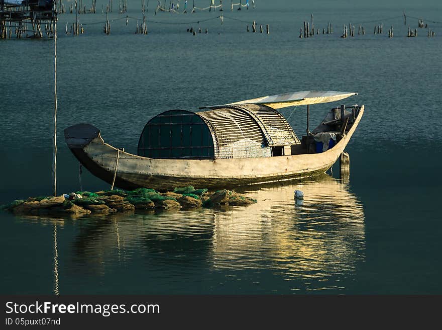 Boat on the Lap An pond, Lang co town, Hue, Vietnam. Boat on the Lap An pond, Lang co town, Hue, Vietnam