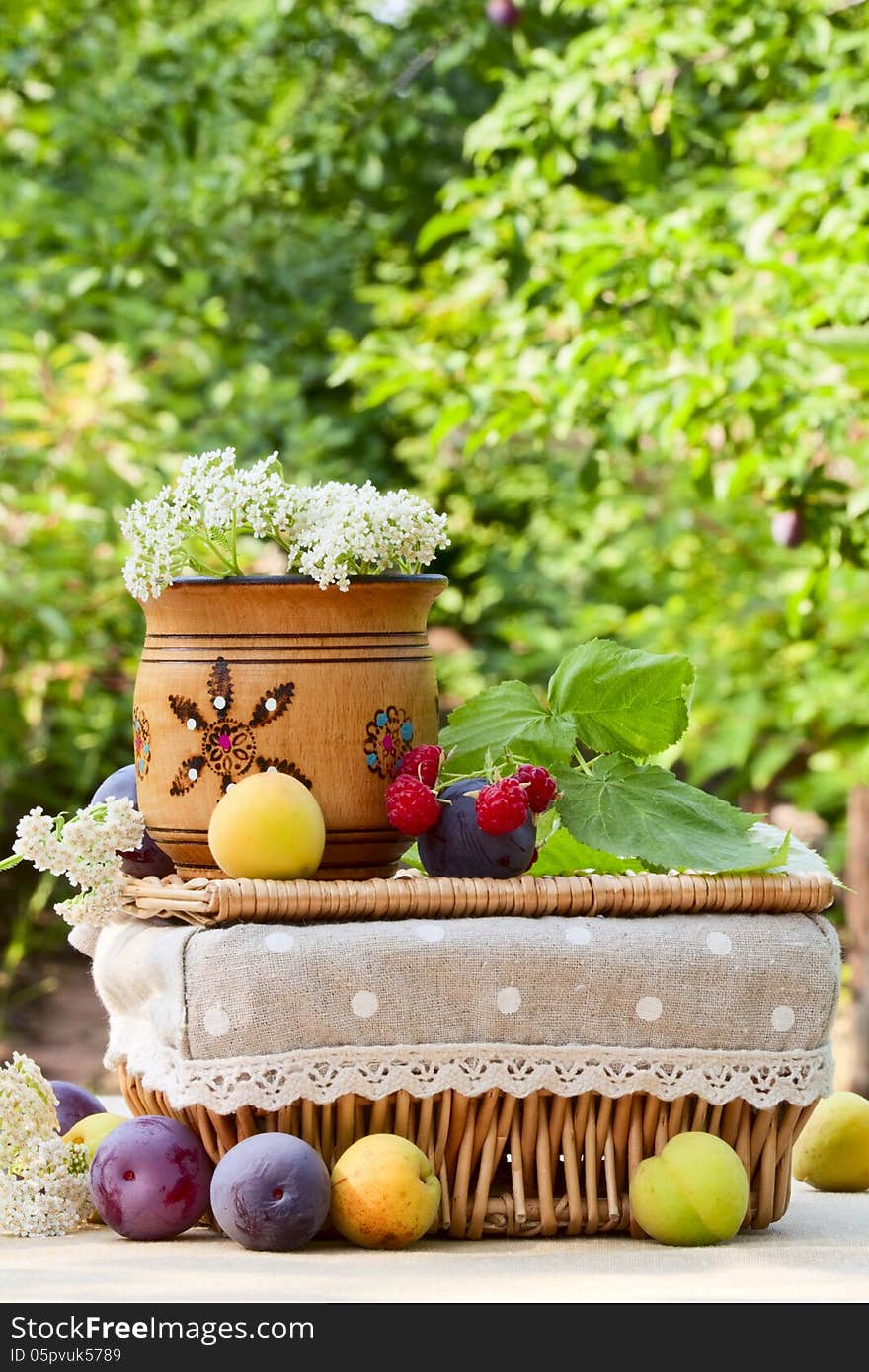 Ripe fruit and wild flowers