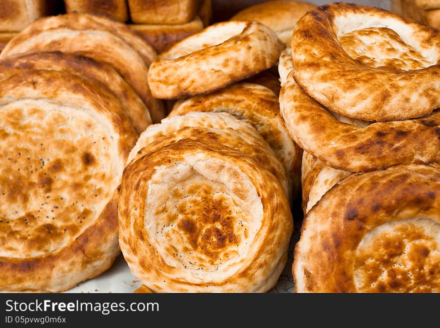 Traditional asian bread for sale at bakery in market place