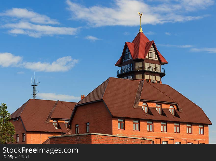 Fire station, red high tower with a on the top. Fire station, red high tower with a on the top