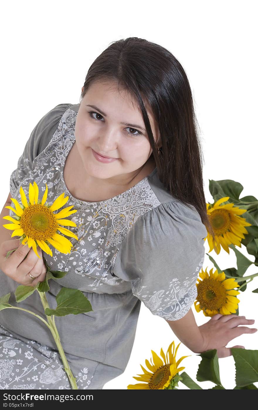 Portrait Of A Beautiful Girl With Sunflowers