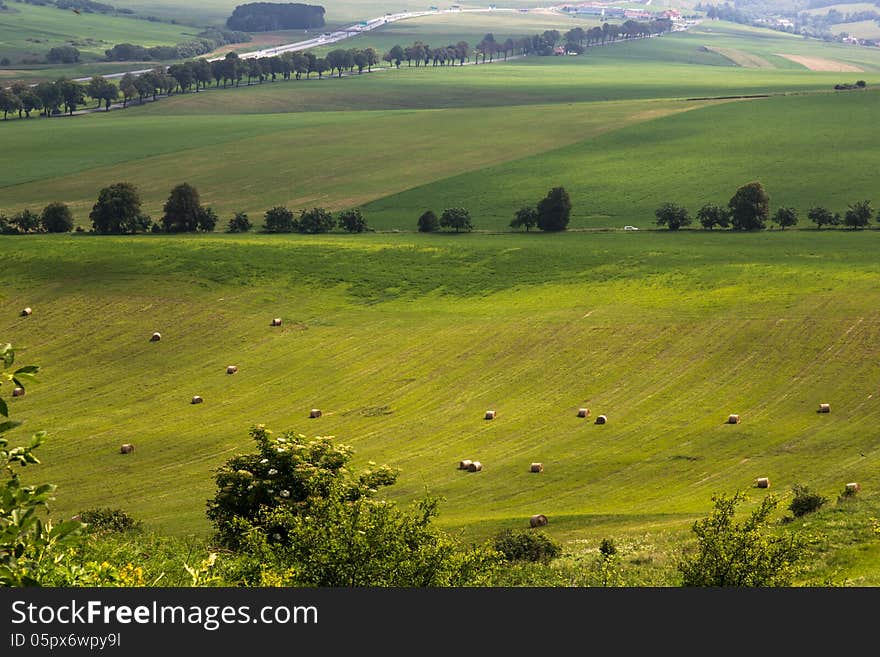 Making hay, and beautiful landscape