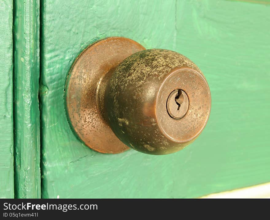 Vintage door knob on old wooden door