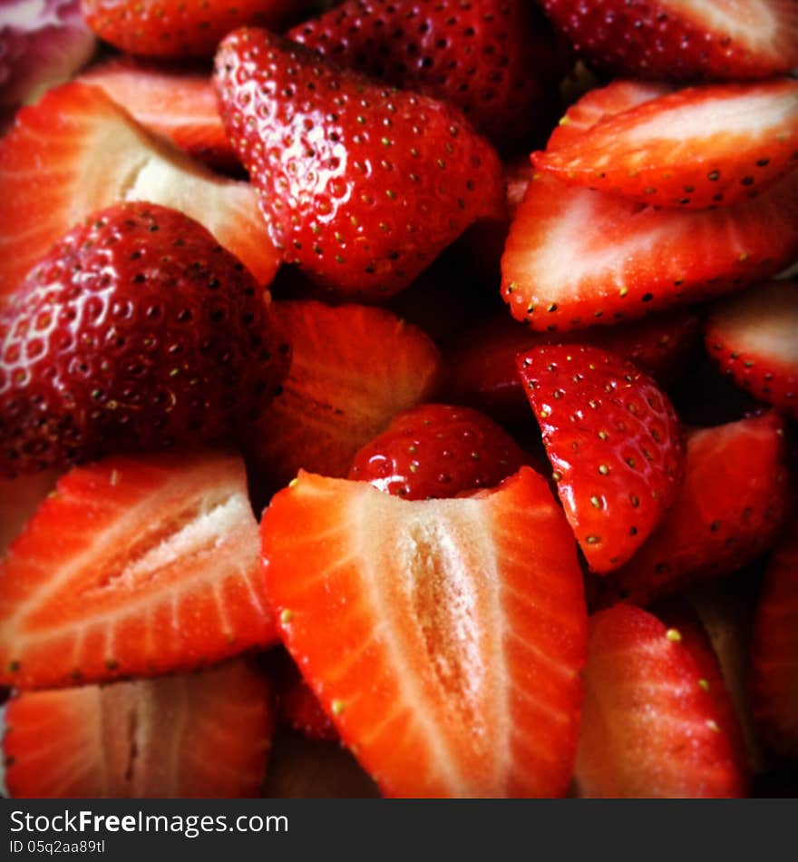 Close up with delicious cut strawberries