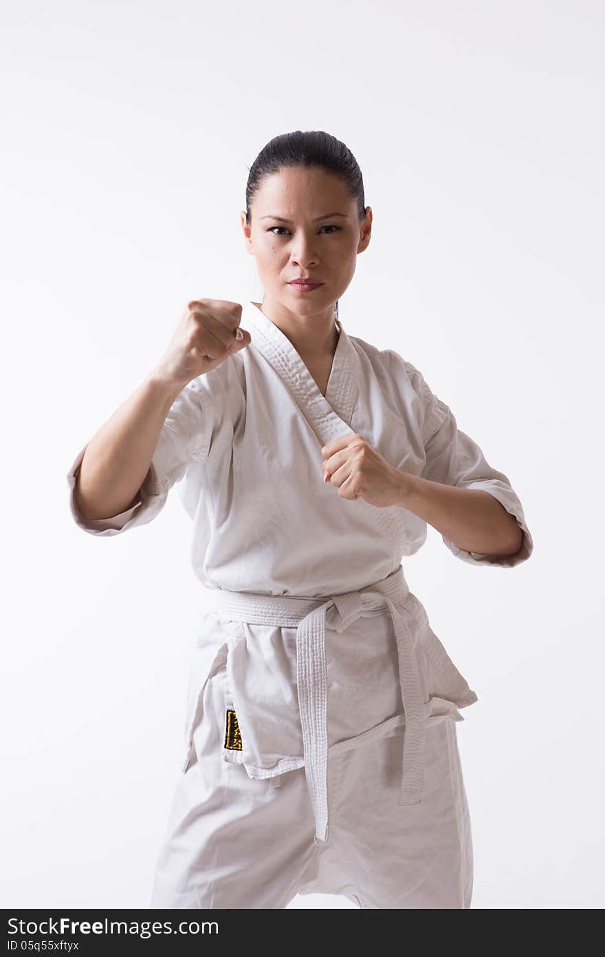 Asian woman in kimono show block in martial art exercise. Asian woman in kimono show block in martial art exercise