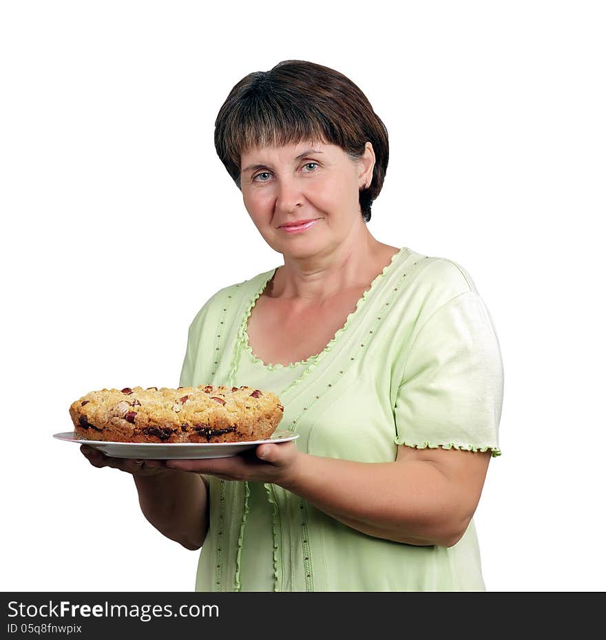 Portrait of a middle-aged woman holding a home-baked