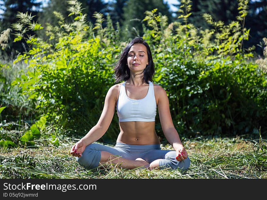 Young Woman Doing Yoga Outdoor