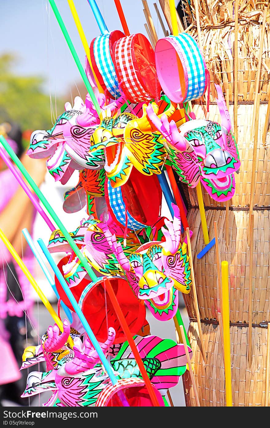 Rattle drum toy with dragon wrapped handle