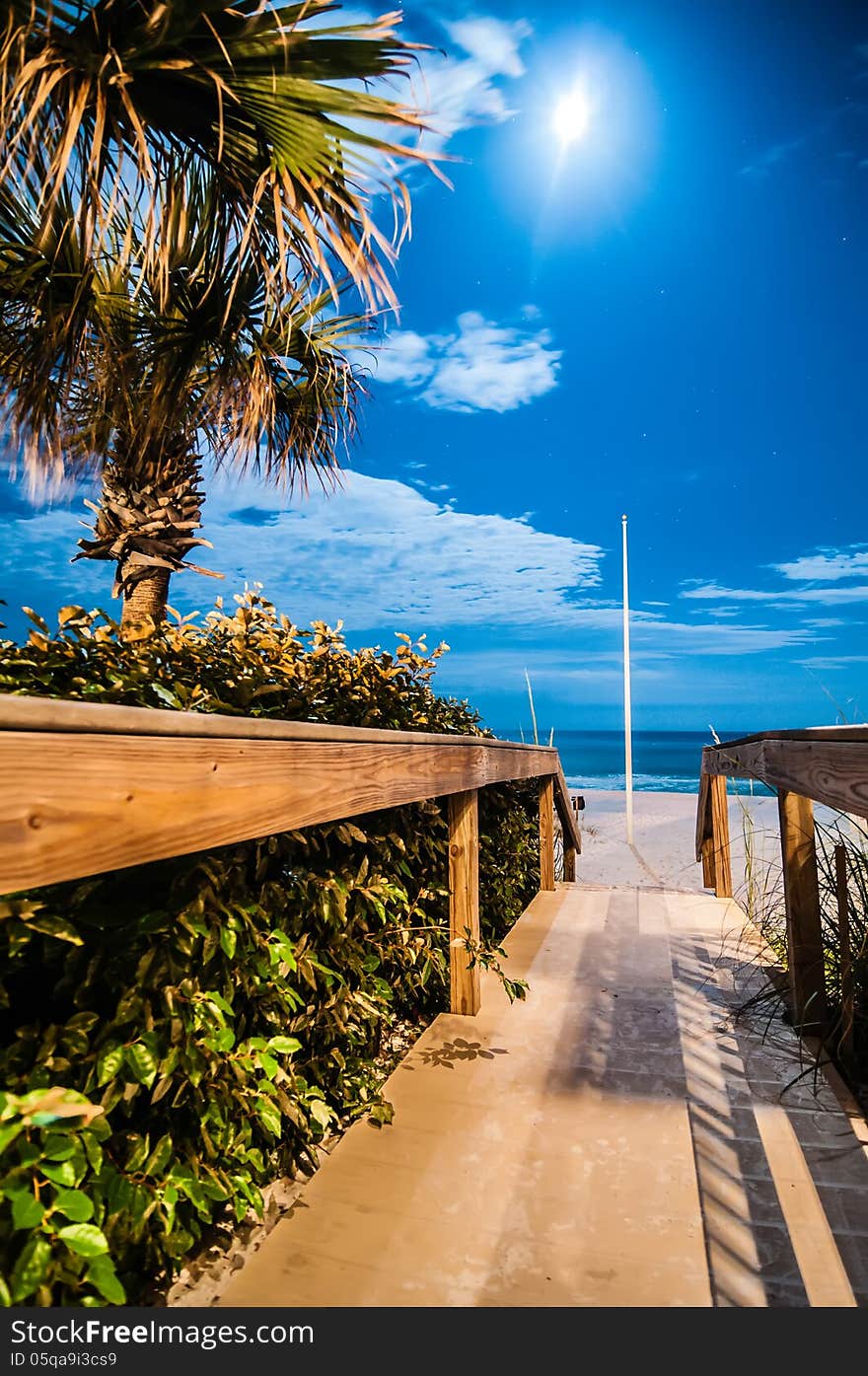 Public walk to the beach at night