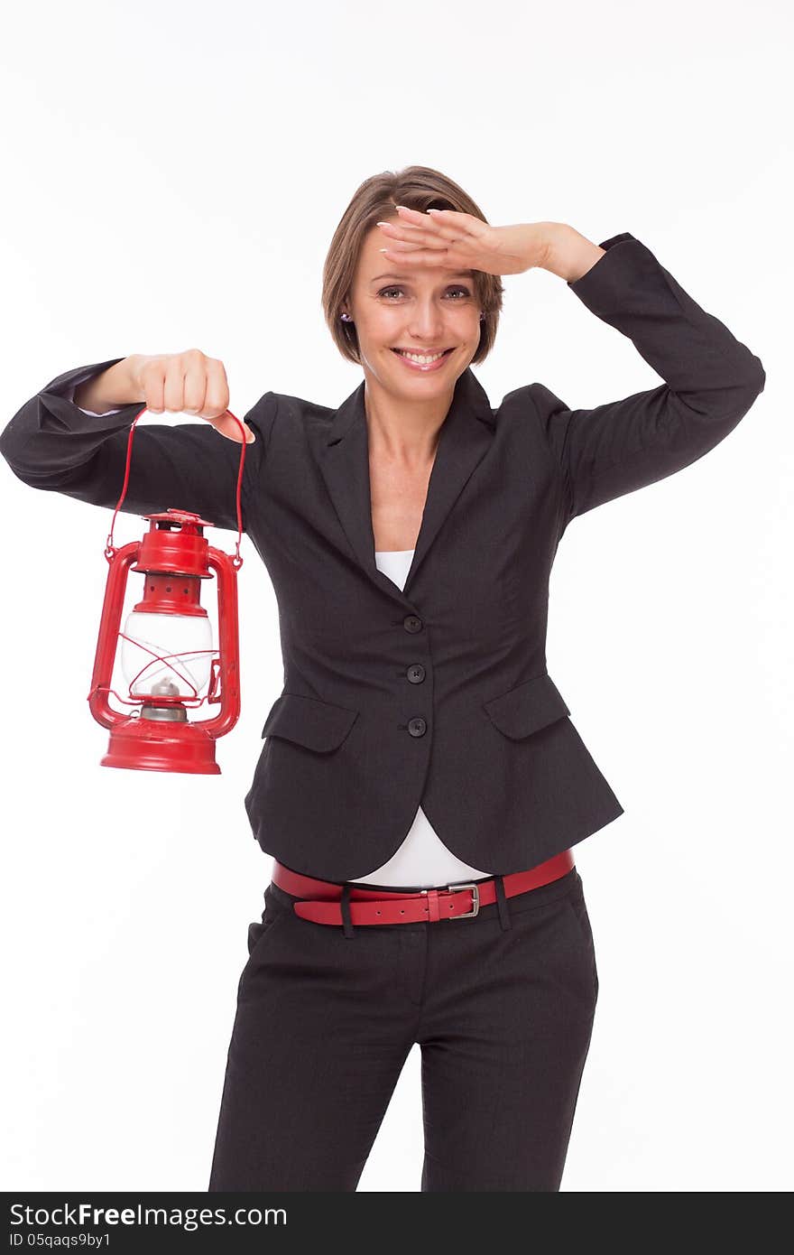 Businesswoman  with red kerosene lamp