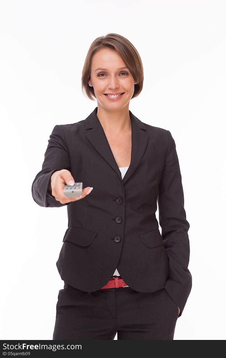 Businesswoman With Remote Control On White