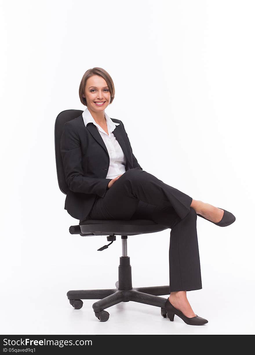 Businesswoman sit on chair isolated with white