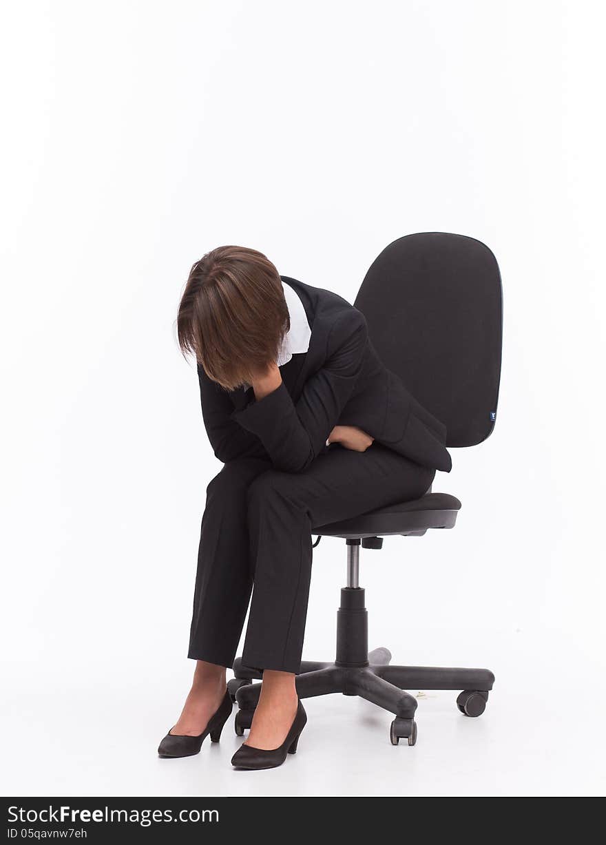 Sad businesswoman sit on chair isolated with white