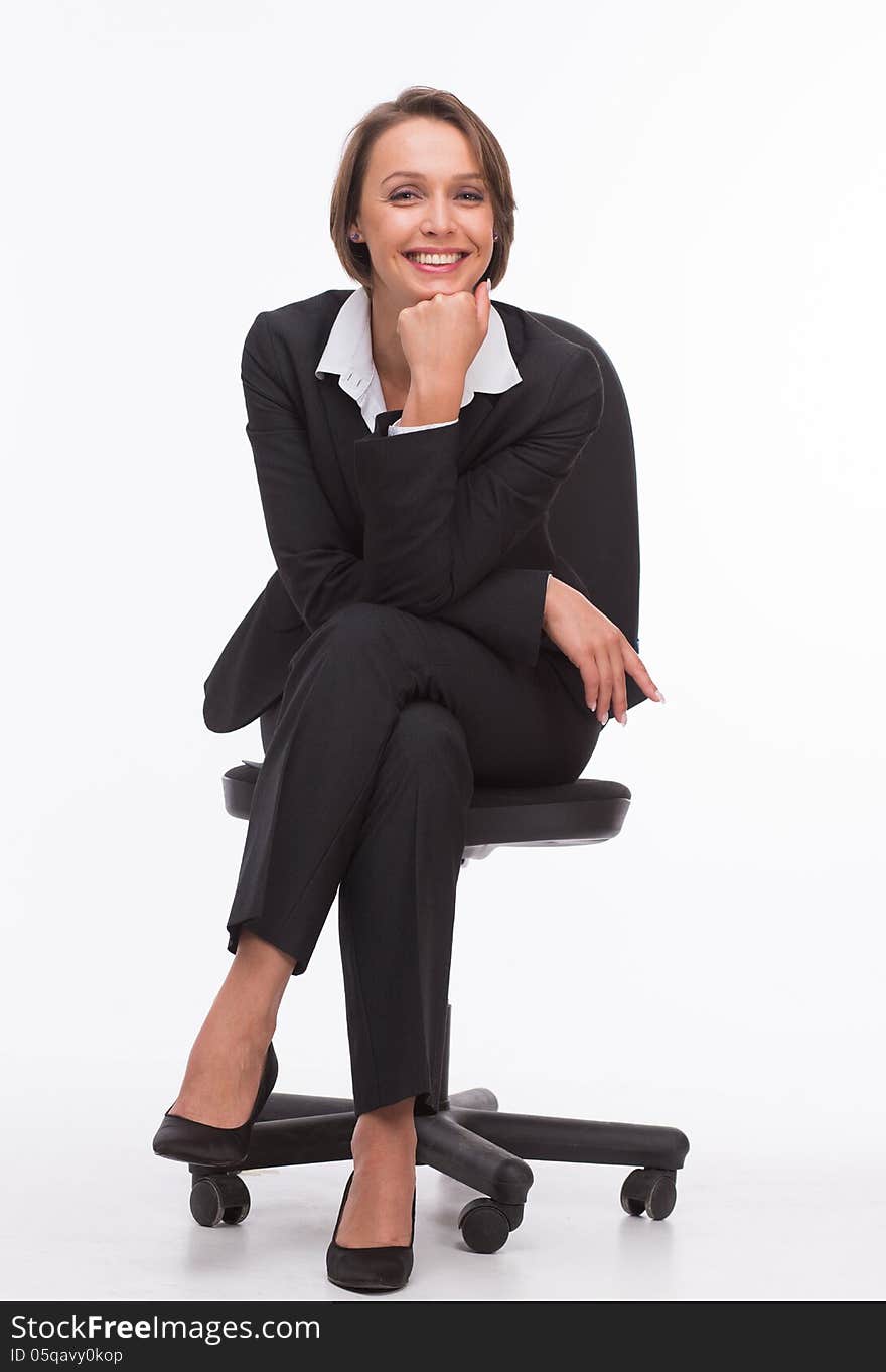 Businesswoman sit on chair isolated with white