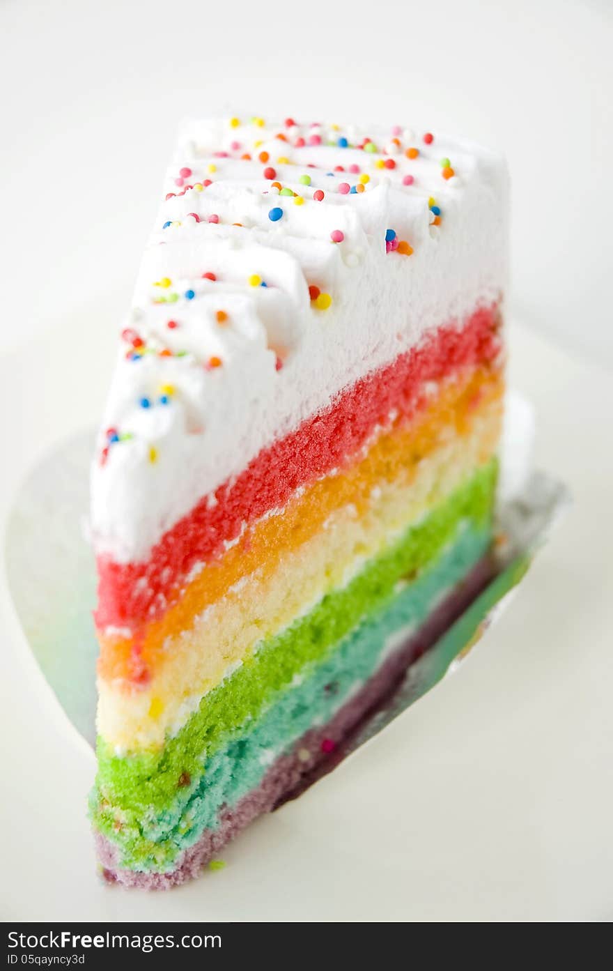 Close up rainbow cake on plate