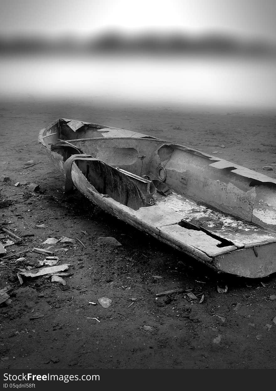 Abandoned ship wreck on the shore of Lake