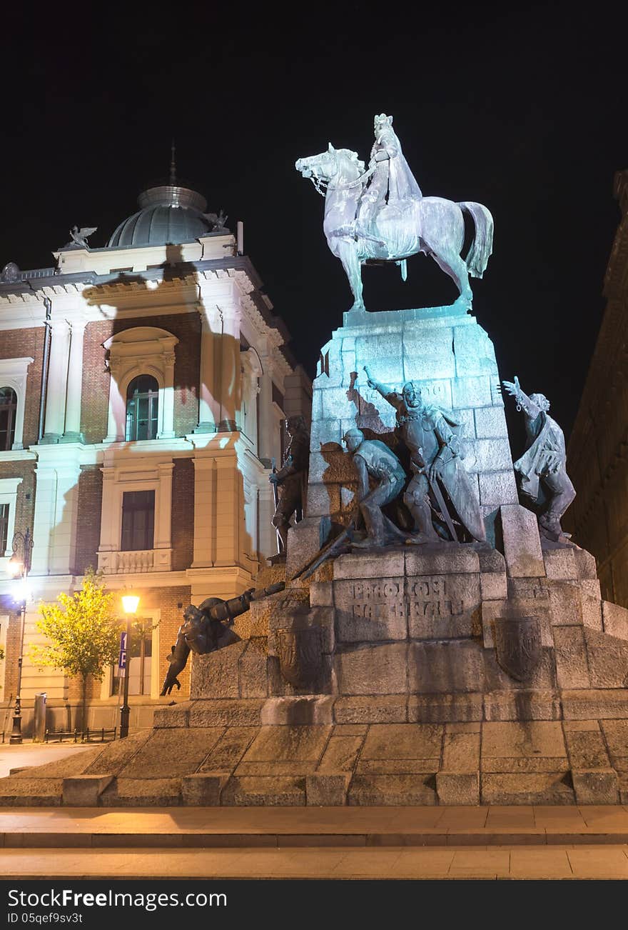 Grunwald monument at night, Plac Matejki, Krakow, Poland.And shadow on the building