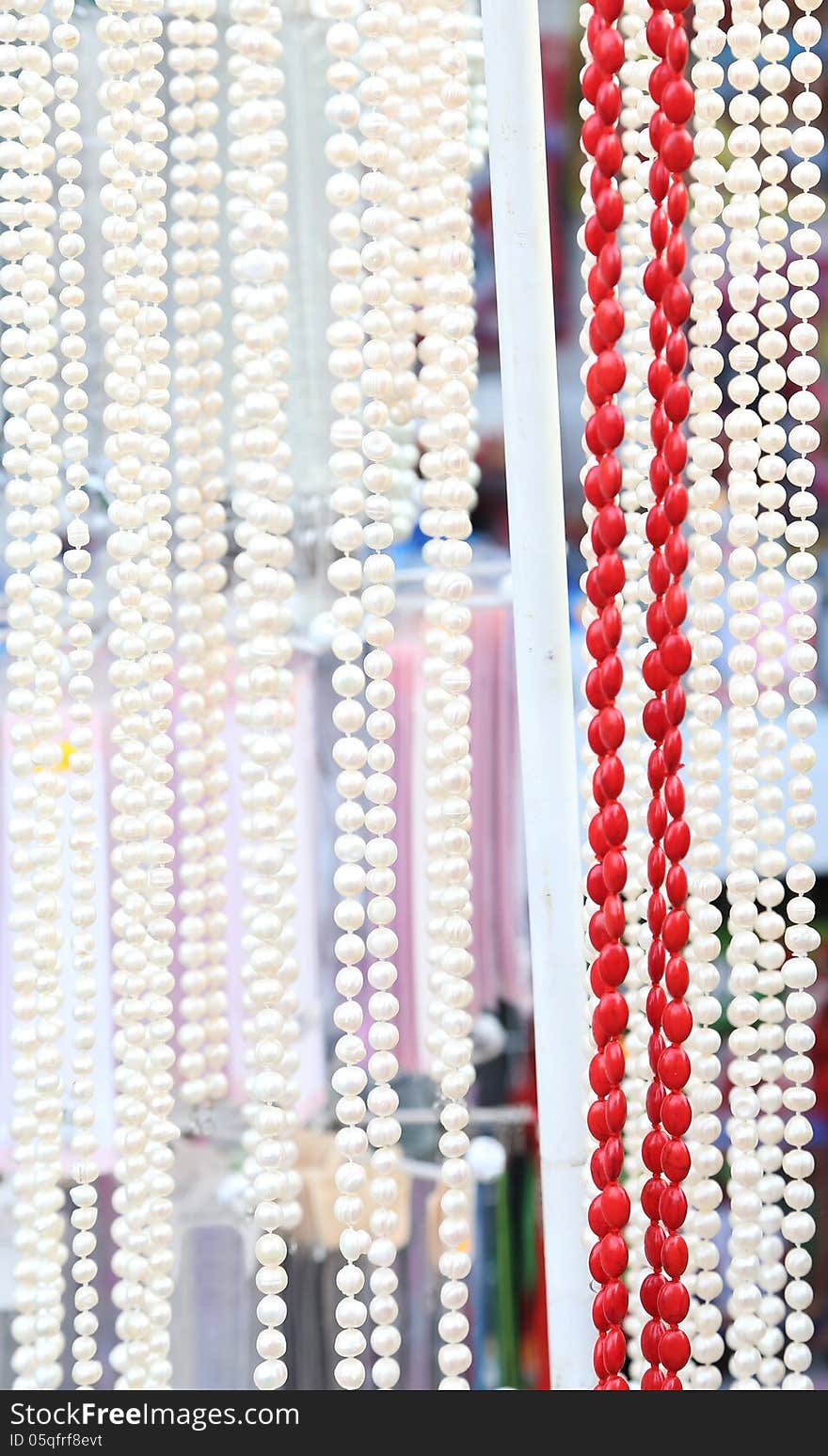 Many Beads Of Pearls And Corals. Close-up.