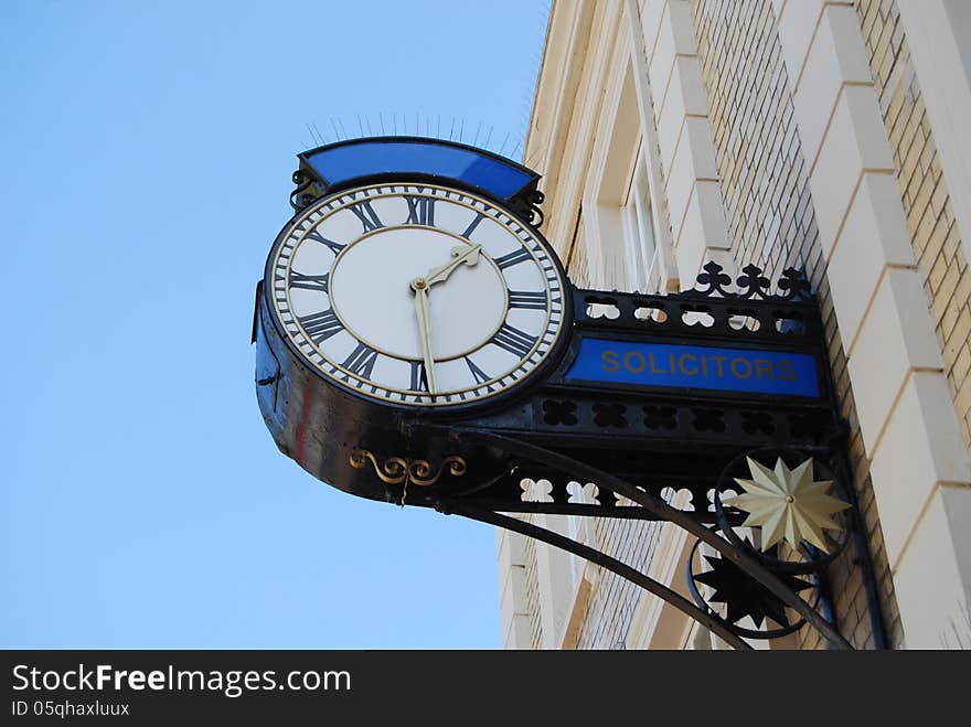 Public clock on building in historic Poole, Dorset. Public clock on building in historic Poole, Dorset