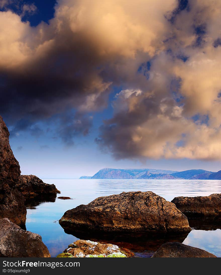 Summer landscape with clouds over the sea