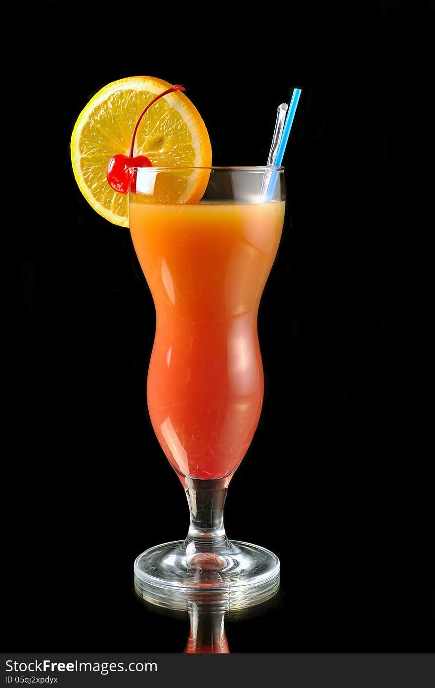 Cocktail smoothies tropical fruit on a black background