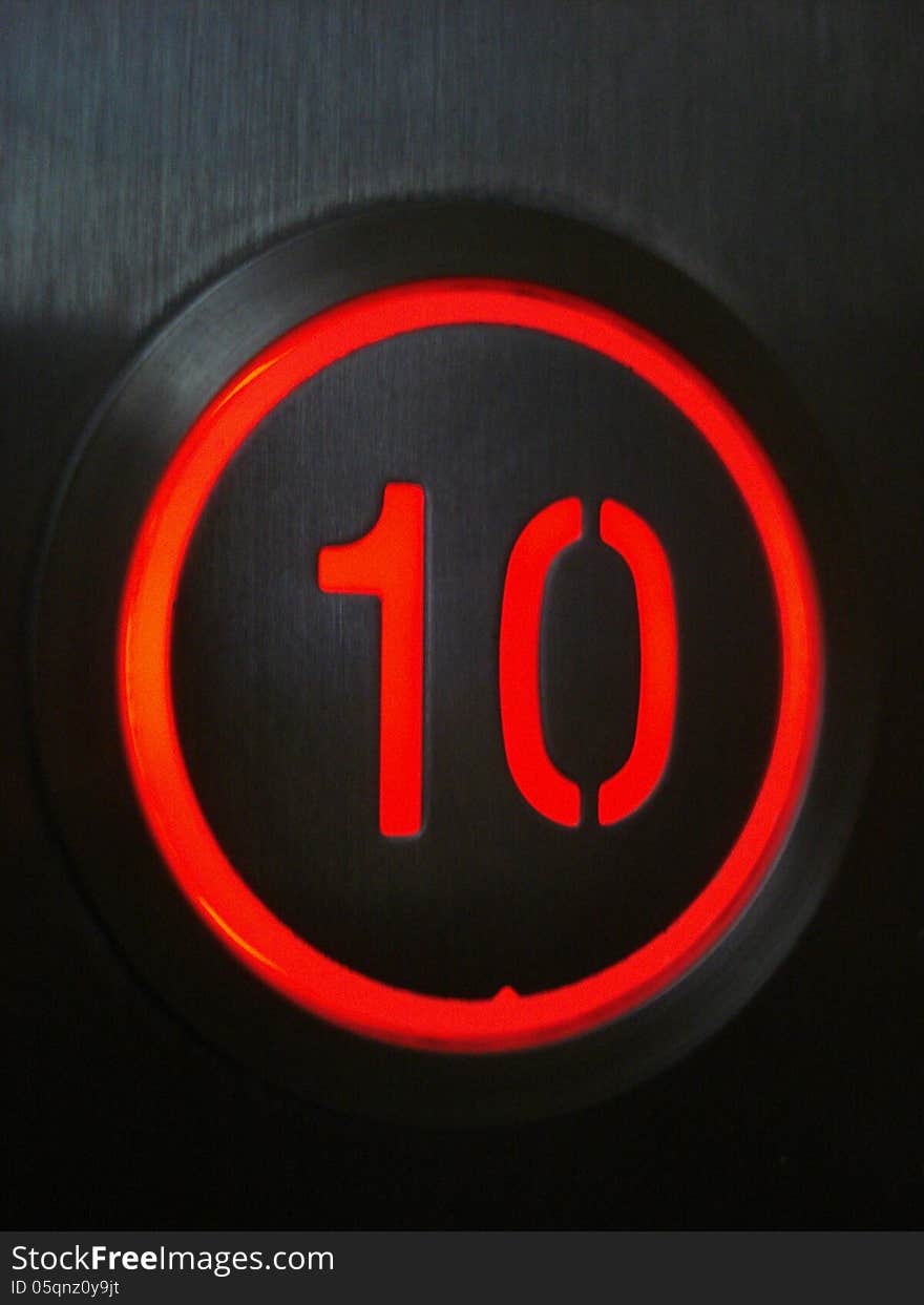 Elevator lit button for tenth floor