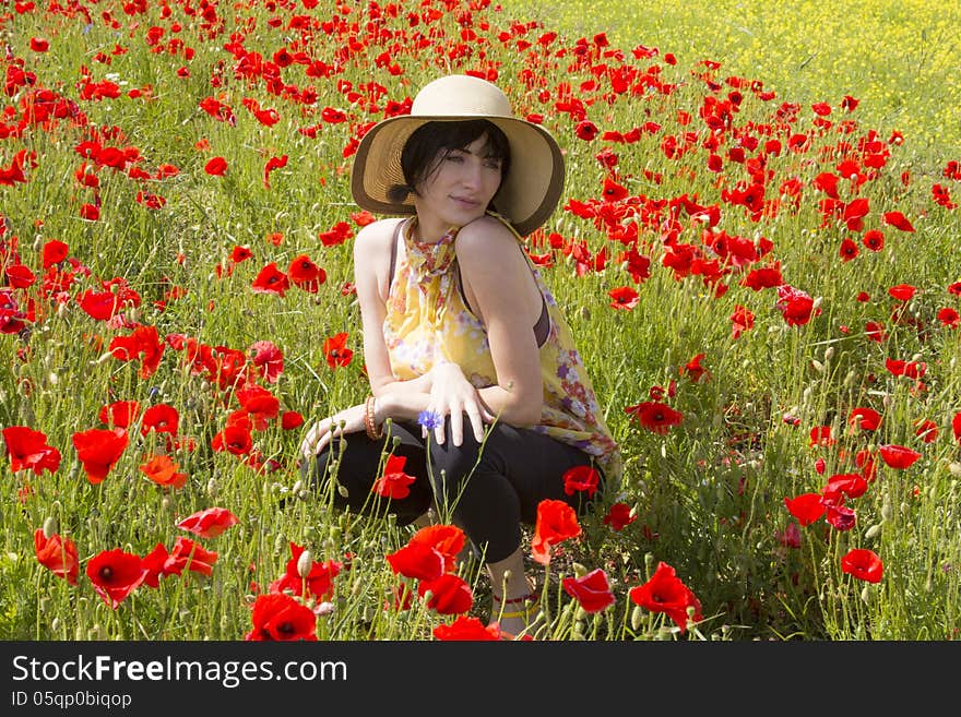 Portrait of summer girl on flowers.