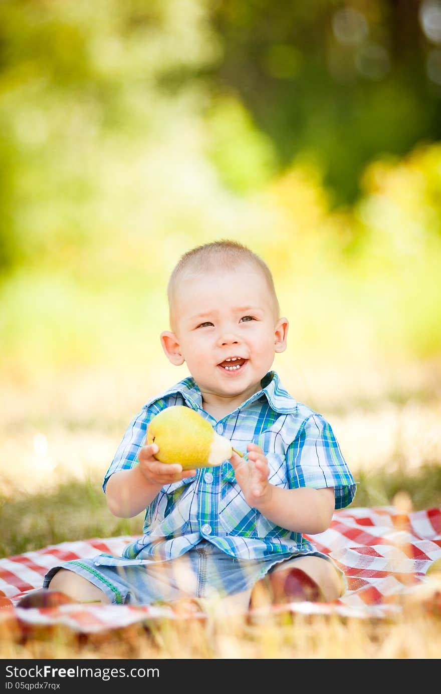 Cute little baby have a picnic. This image has attached release.