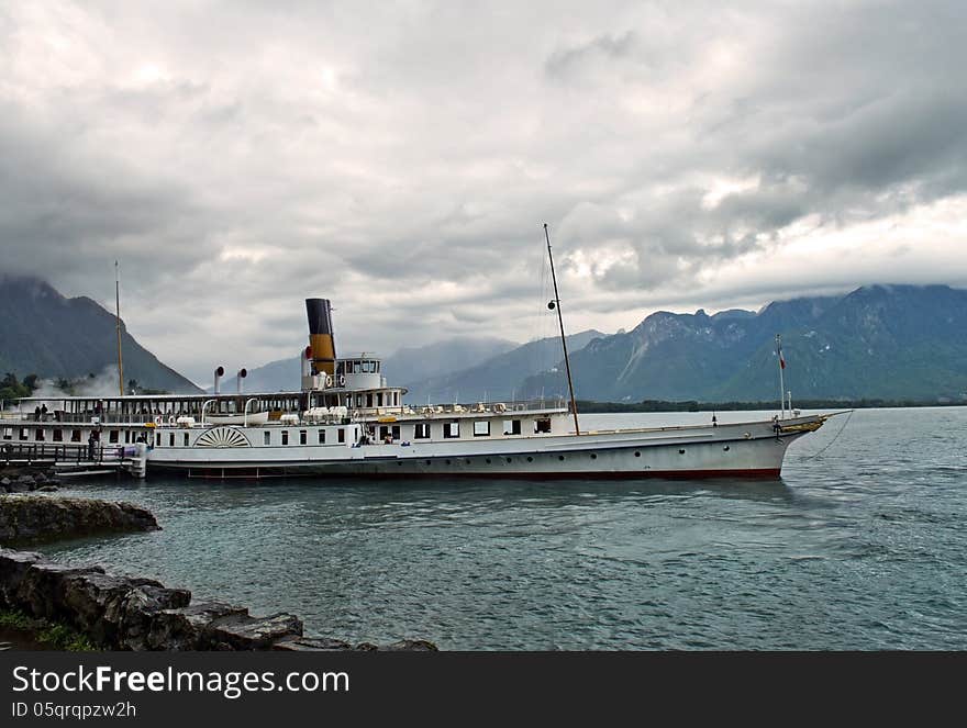 Old retro steamer, floating with the tourists on Lake Geneva, Switzerland. Old retro steamer, floating with the tourists on Lake Geneva, Switzerland