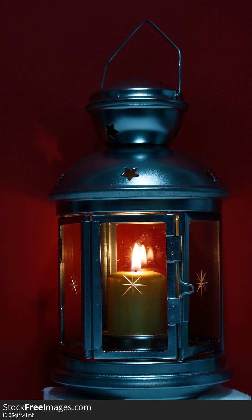 Old lantern with burning candle. Old lantern with burning candle