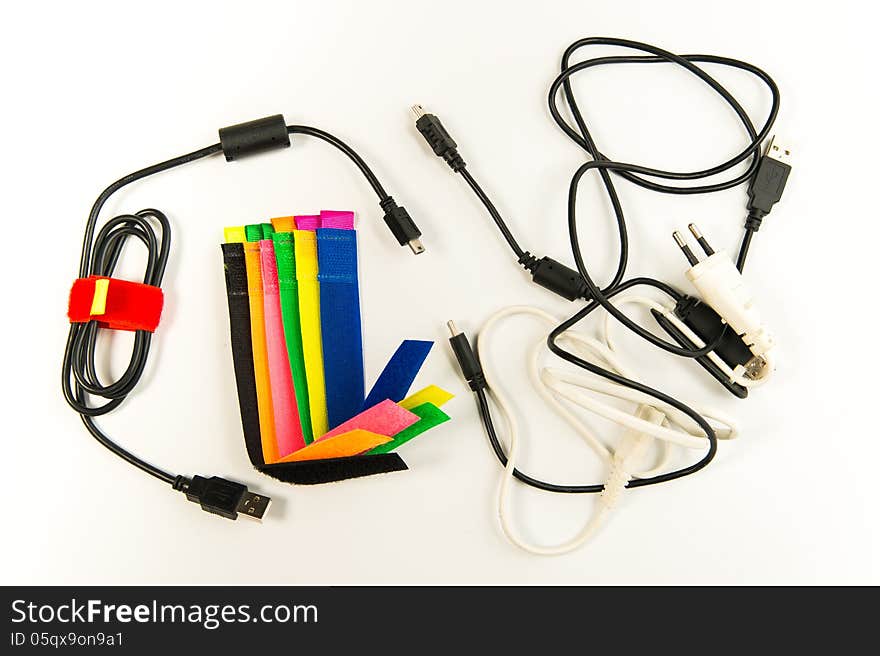 Colorful marker straps with wire and cables isolated on white background