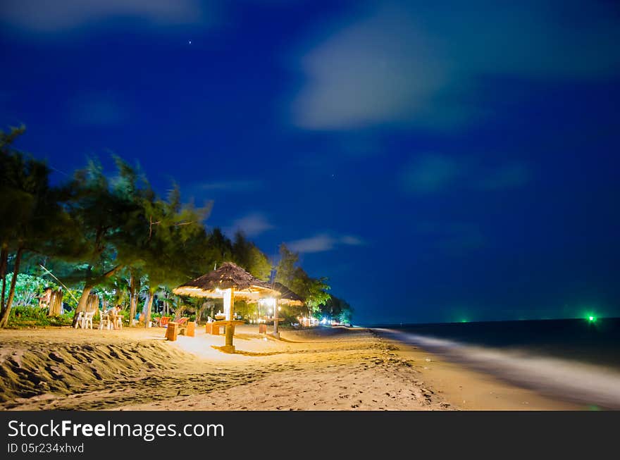 The night beach with deep blue sky