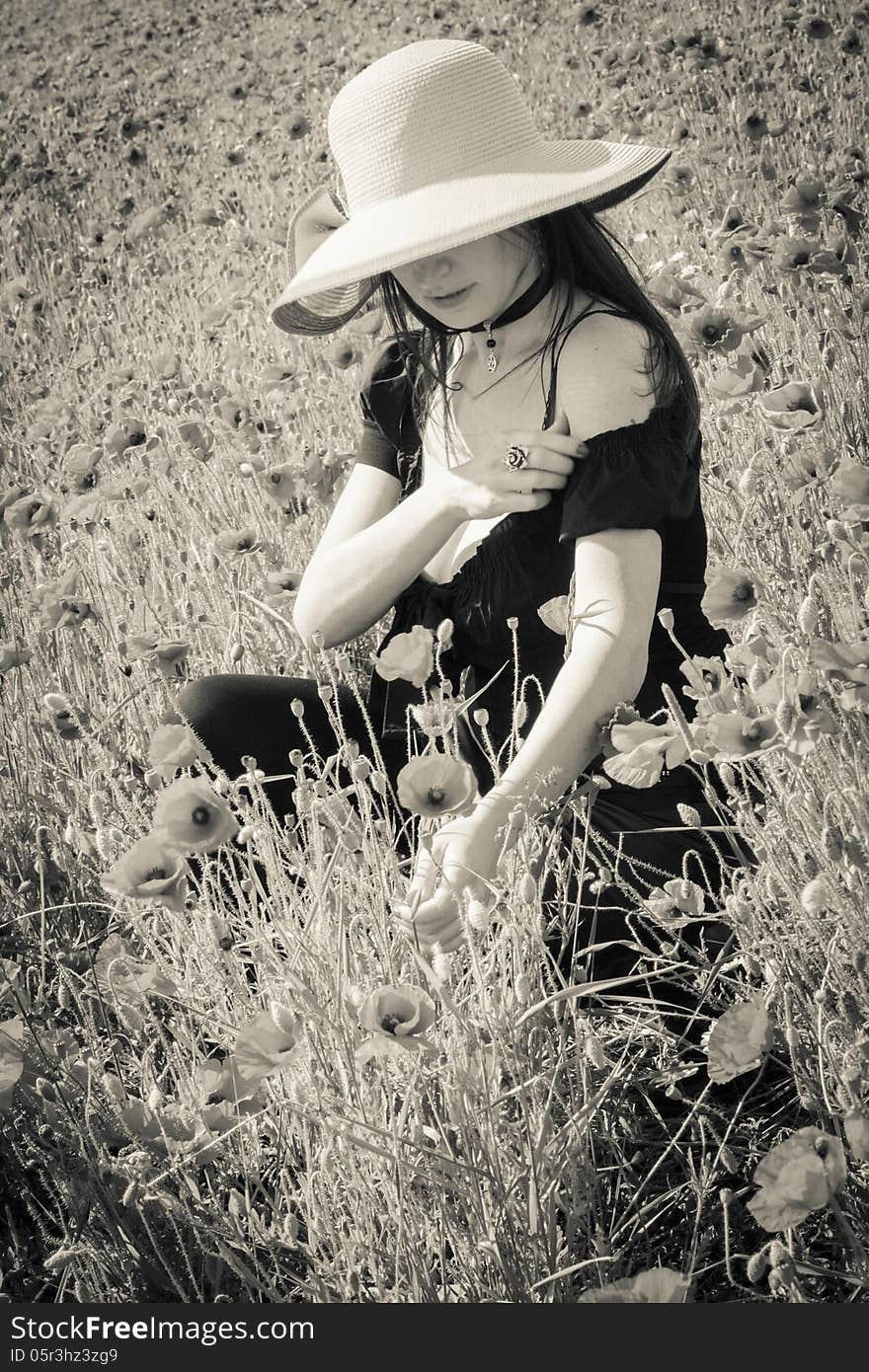 Portrait of summer gothic girl on field