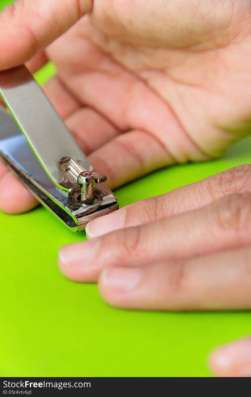 Hand manicure with nail clipper