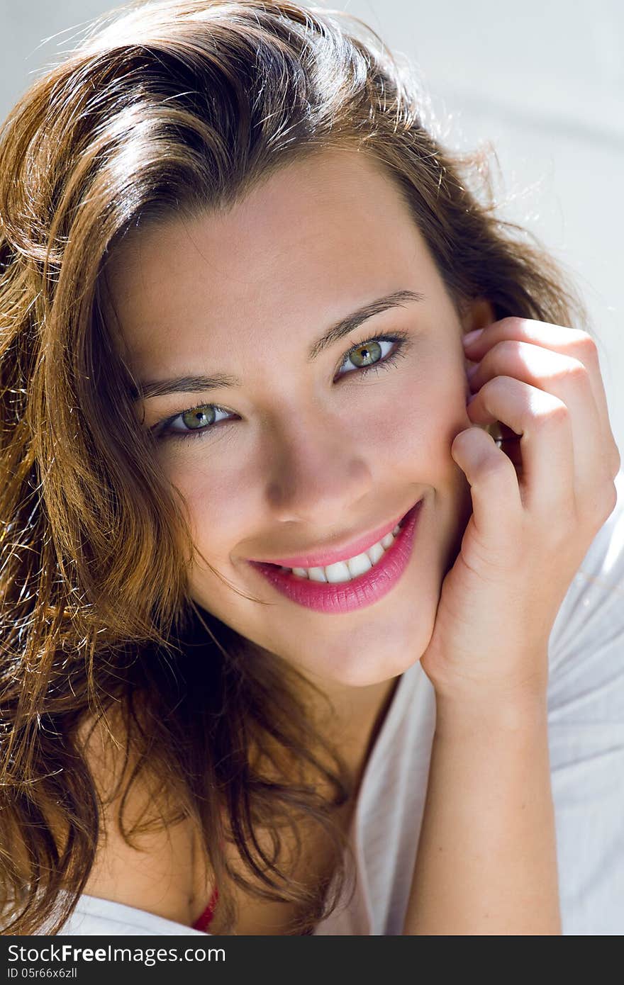 Portrait of beautiful woman with smile at home