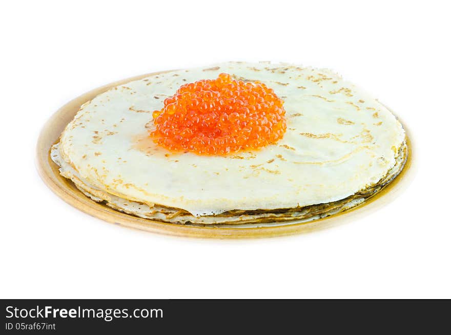 The isolated plate with pancakes and caviar on a white background