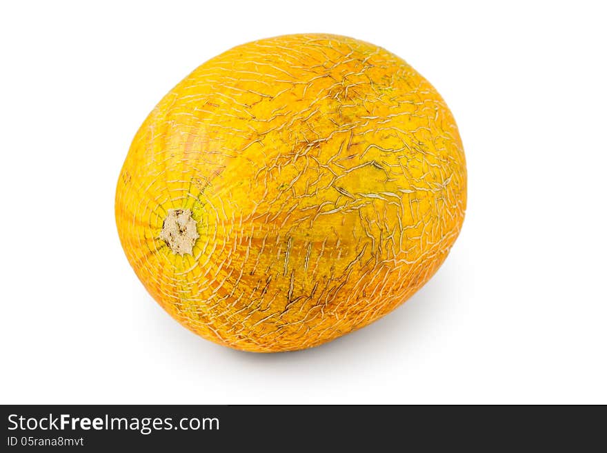 The ripe melon is photographed on a white background