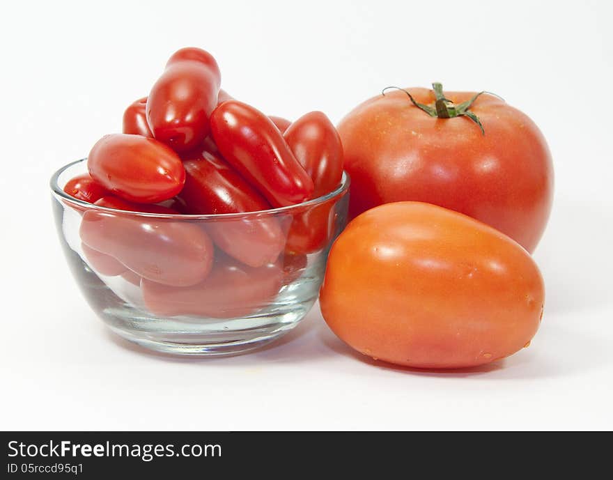 Three Types of Tomatoes and a Glass Bowl