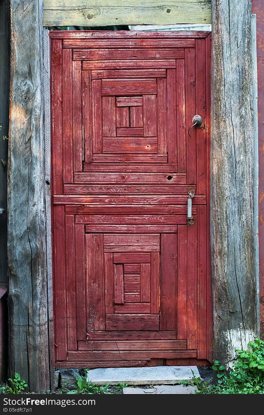 Old Rural Door Of Red Color