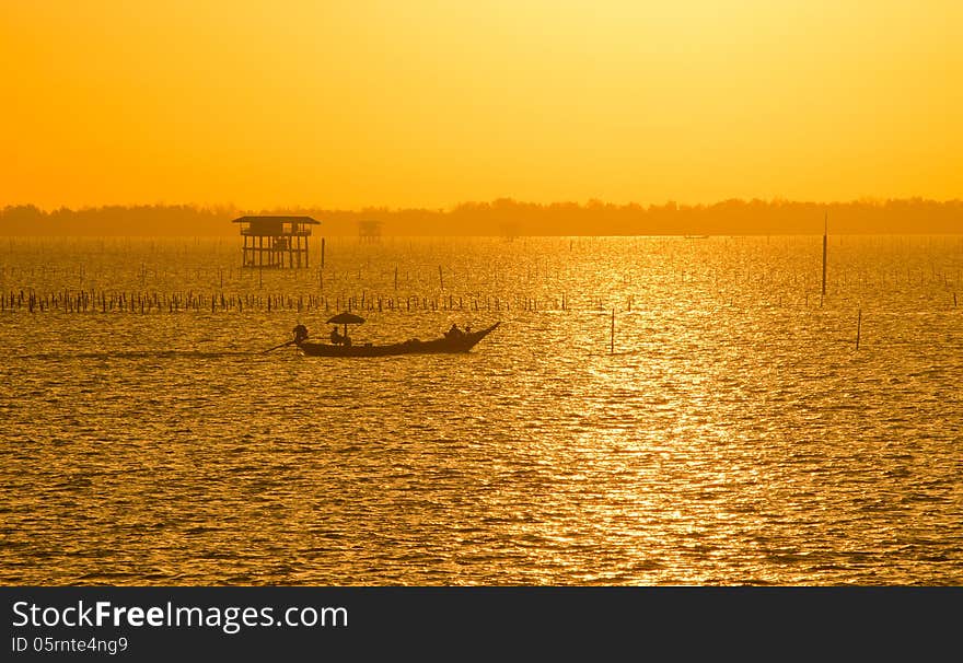 Fisherman boat with sunrise on the sea. Fisherman boat with sunrise on the sea