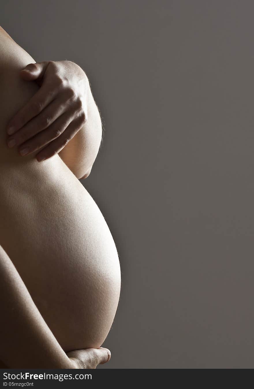 Close up on Caucasian's women pregnant belly. Close up on Caucasian's women pregnant belly