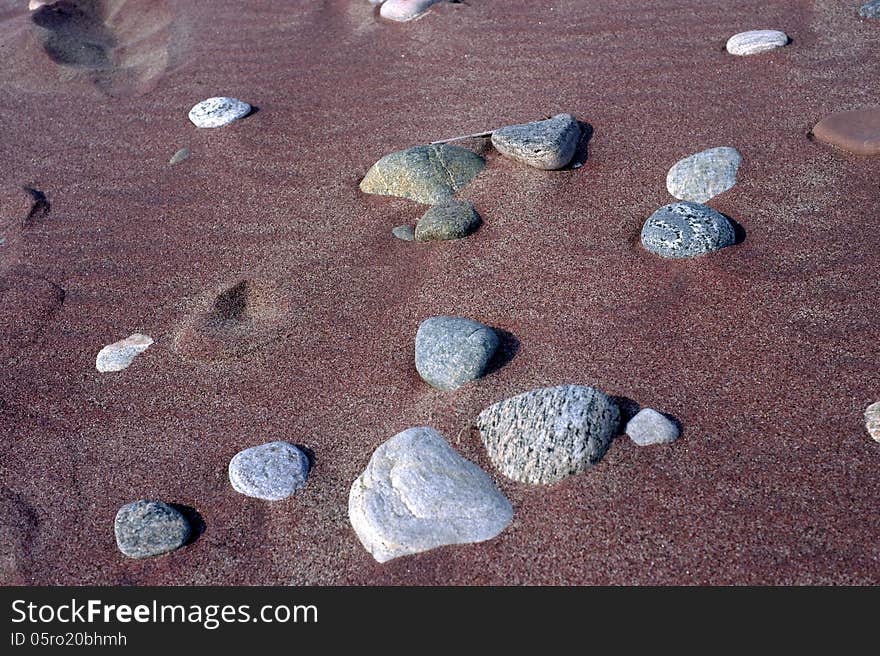 Stones on sand