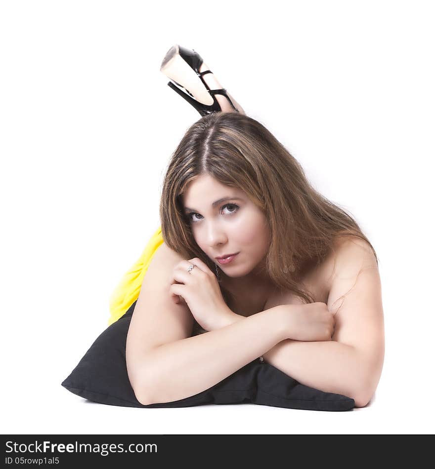 Isolated woman with pillow on white background looking you