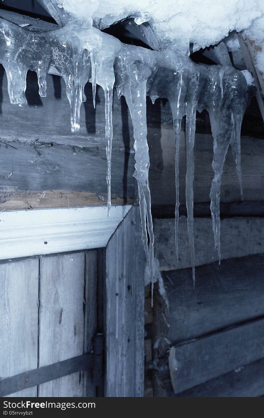 Icicles hang from the roof