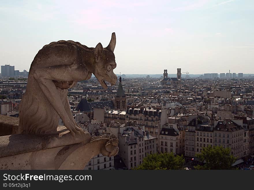 A view on a Paris from Gallery gargoyles at Notre Damme de Paris. A view on a Paris from Gallery gargoyles at Notre Damme de Paris